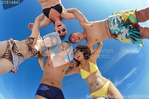 Image of group of happy young people have fun on bach