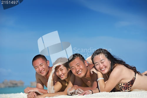 Image of group of happy young people have fun on bach