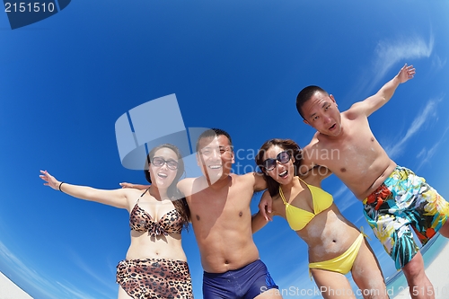 Image of group of happy young people have fun on bach