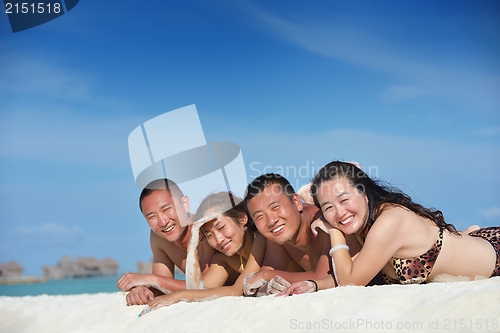 Image of group of happy young people have fun on bach
