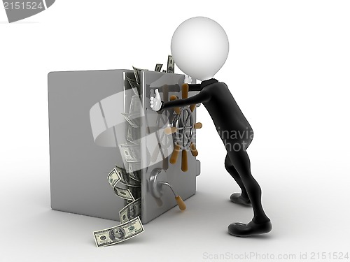 Image of Businessman trying to close a security box full of money