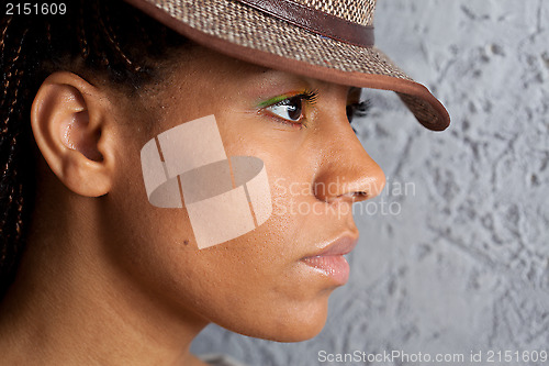 Image of portrait of a girl in hat