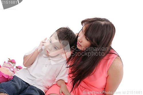 Image of young mother and her son spend time together.  Focus in the litt