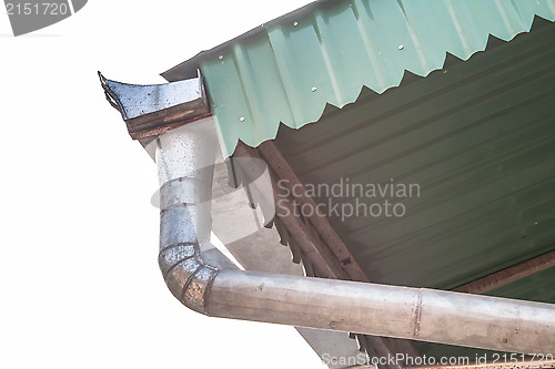 Image of House roof gutter 