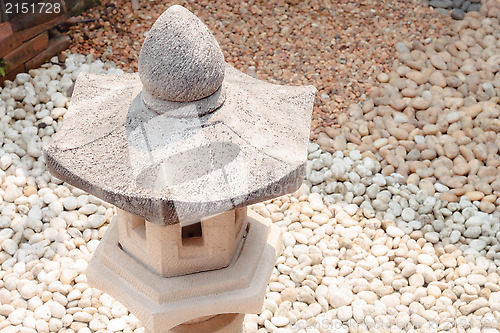 Image of Mini pavillion rock lamp in home garden