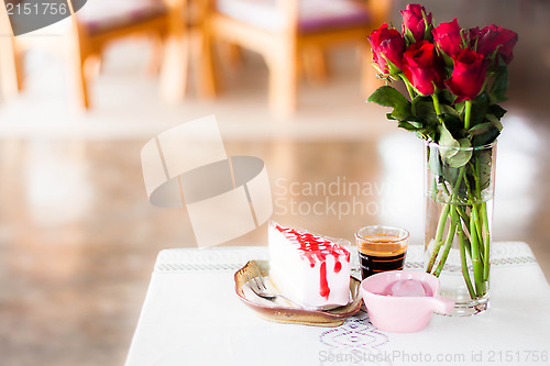 Image of Single coffee espresso shot and homemade cake  