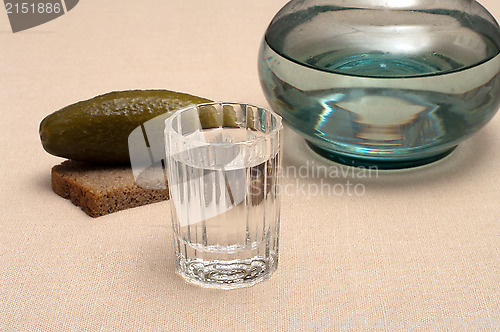 Image of Vodka and snack.