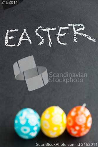 Image of Colorful Easter eggs and text