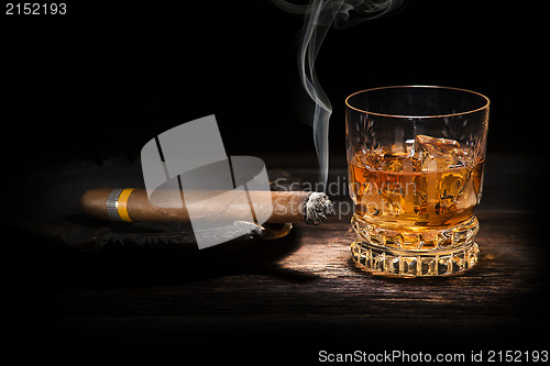 Image of Whiskey and cigar