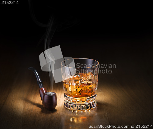 Image of Pipe and whiskey