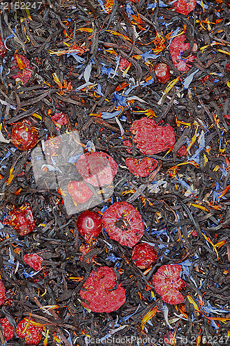 Image of black tea with dried berries, textura