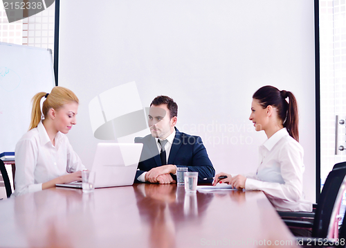 Image of business people in a meeting at office