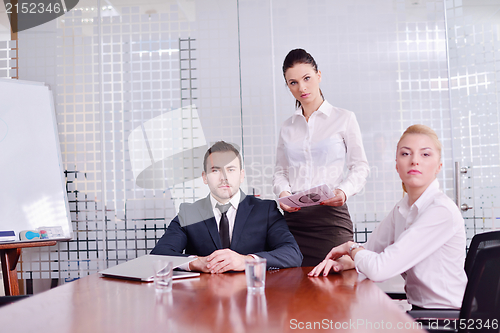 Image of business people in a meeting at office