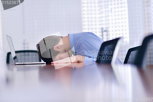 Image of business man with problems and stress in the office