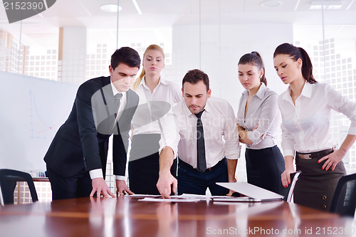 Image of business people in a meeting at office