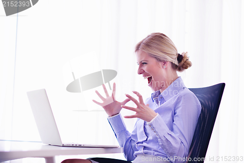 Image of business woman at  office