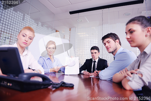 Image of business people in a video meeting