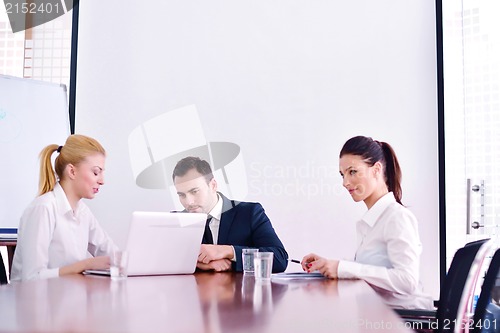Image of business people in a meeting at office