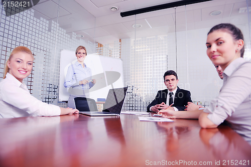 Image of business people in a meeting at office