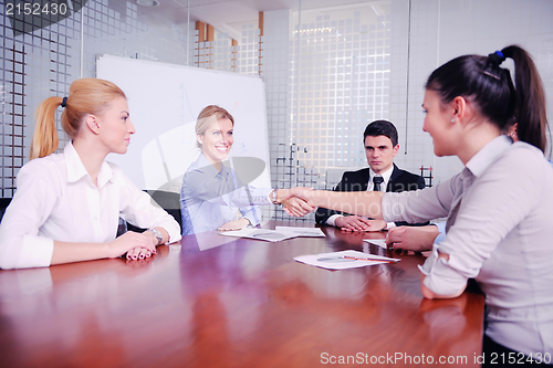 Image of business people in a meeting at office