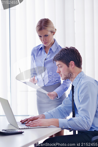 Image of business people in a meeting at office