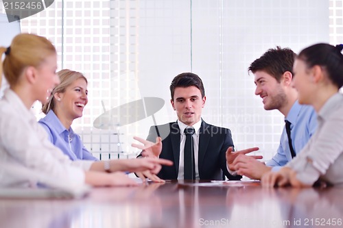 Image of business people in a meeting at office