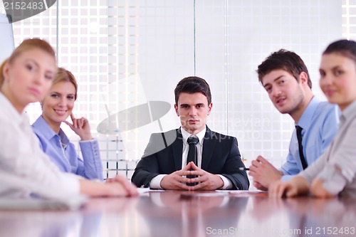 Image of business people in a meeting at office