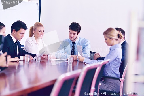 Image of business people in a meeting at office