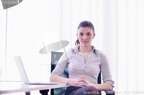 Image of business woman at  office