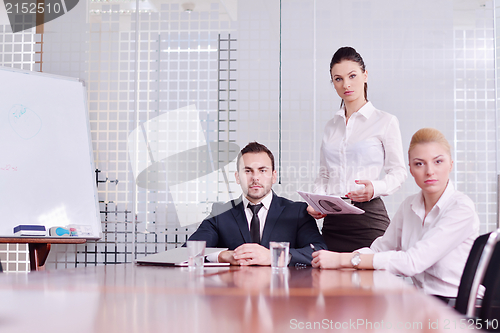 Image of business people in a meeting at office