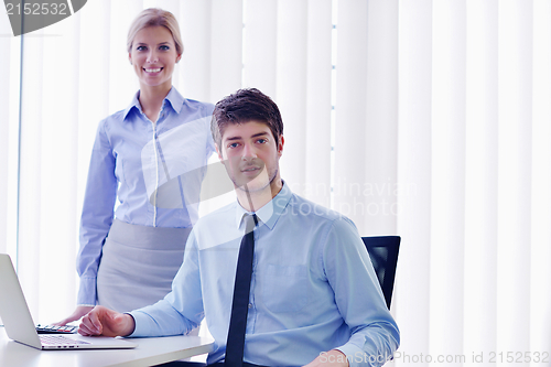 Image of business people in a meeting at office