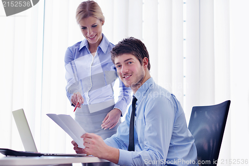 Image of business people in a meeting at office