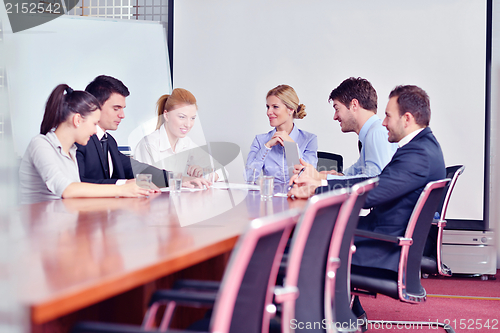Image of business people in a meeting at office