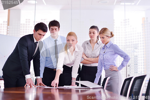 Image of business people in a meeting at office