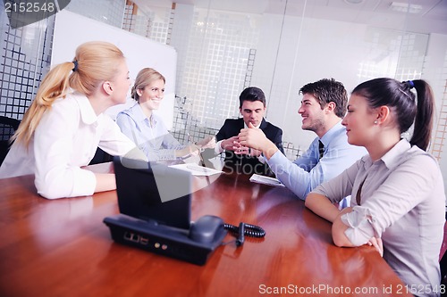 Image of business people in a video meeting