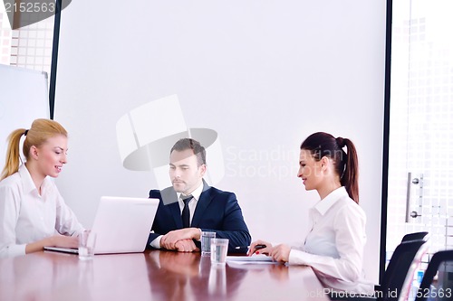 Image of business people in a meeting at office