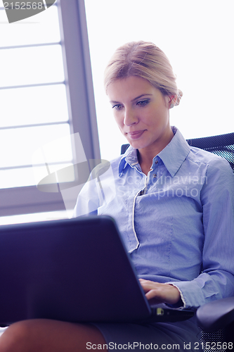 Image of business woman at  office