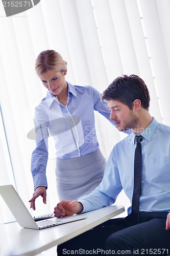 Image of business people in a meeting at office