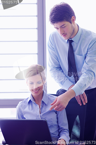 Image of business people in a meeting at office