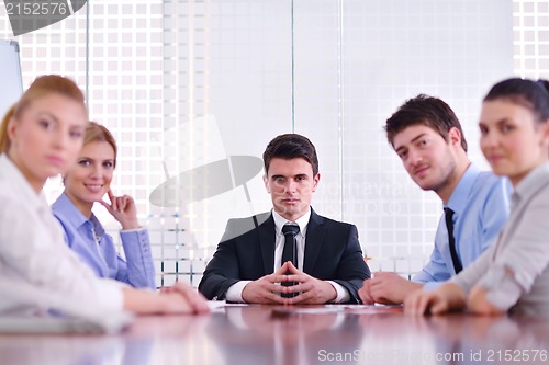 Image of business people in a meeting at office