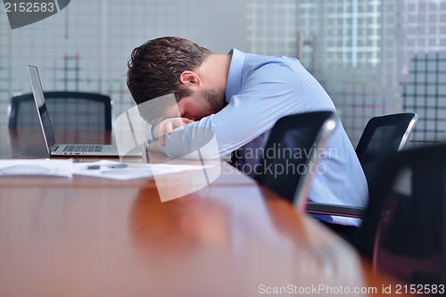 Image of business man with problems and stress in the office