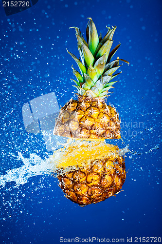 Image of Pineapple splashed with water