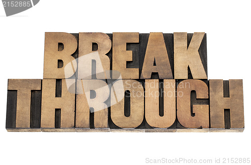 Image of breakthrough word in wood type