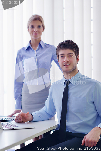 Image of business people in a meeting at office