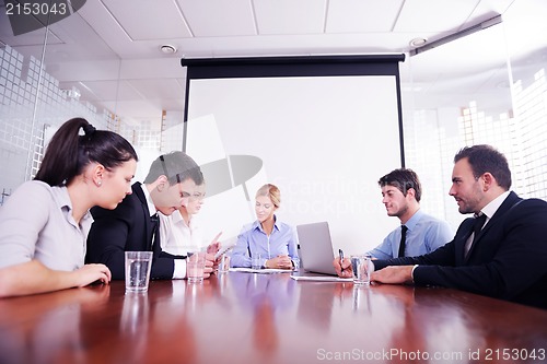 Image of business people in a meeting at office