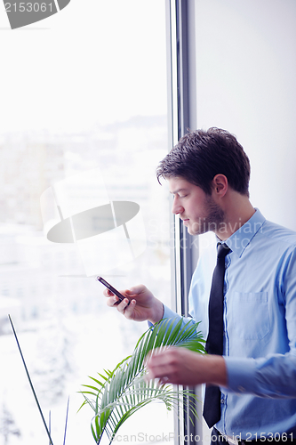 Image of business man talking by cellphone