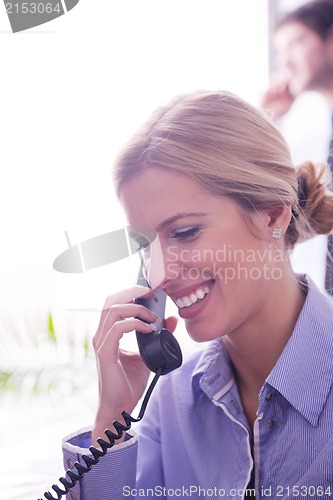Image of business woman talk by phone