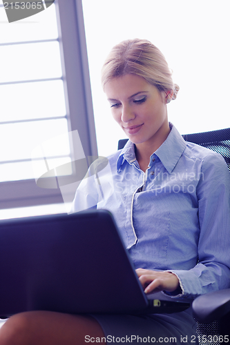 Image of business woman at  office