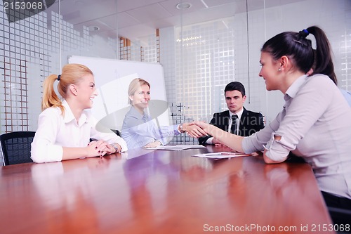 Image of business people in a meeting at office