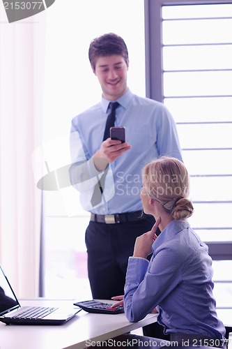 Image of business people in a meeting at office